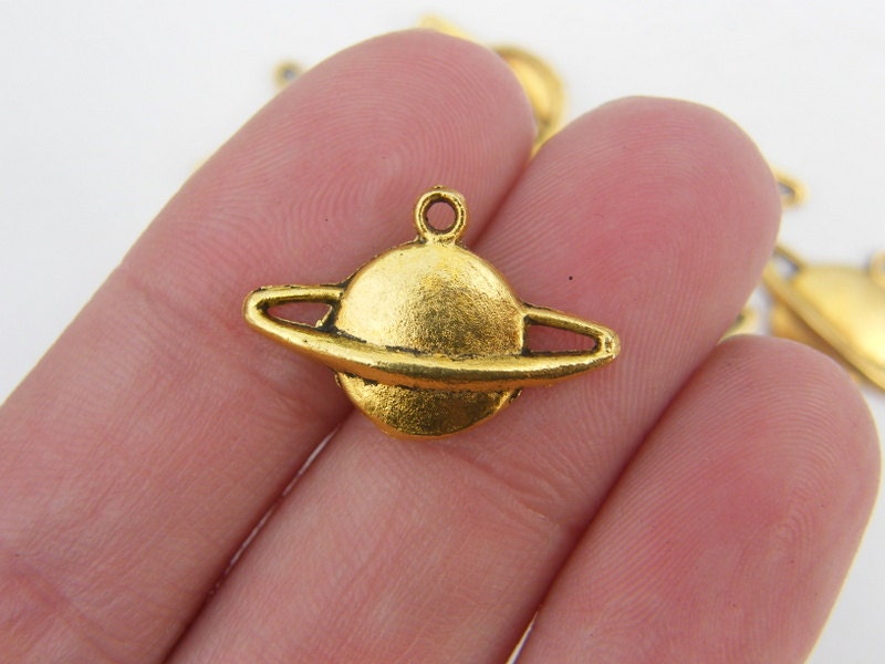 12 Saturn planet charms antique gold tone S204