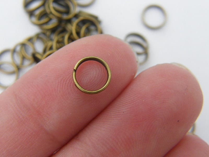 200 Split rings 7mm antique bronze tone