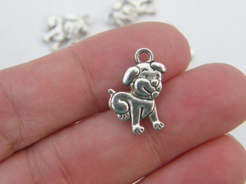 8 Dog charms antique silver tone A886