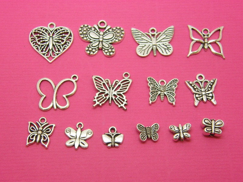 The Butterfly Charms Collection -  11 different antique silver tone charms and 3 spacer beads