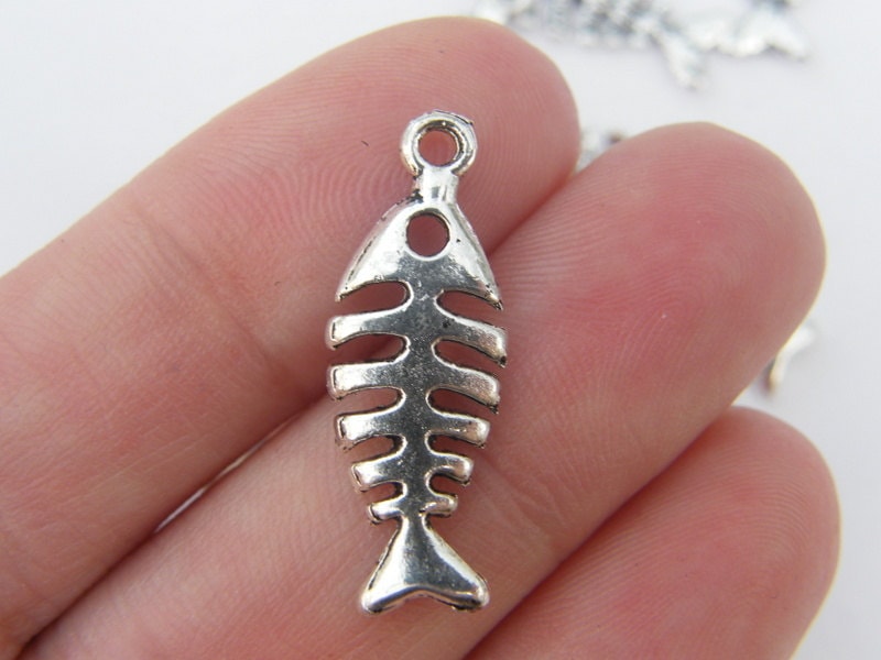 10 Fish bone charms antique silver tone FF52