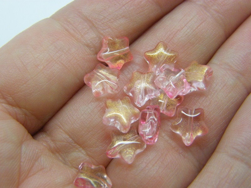30 Star beads gold dust pink glass AB265