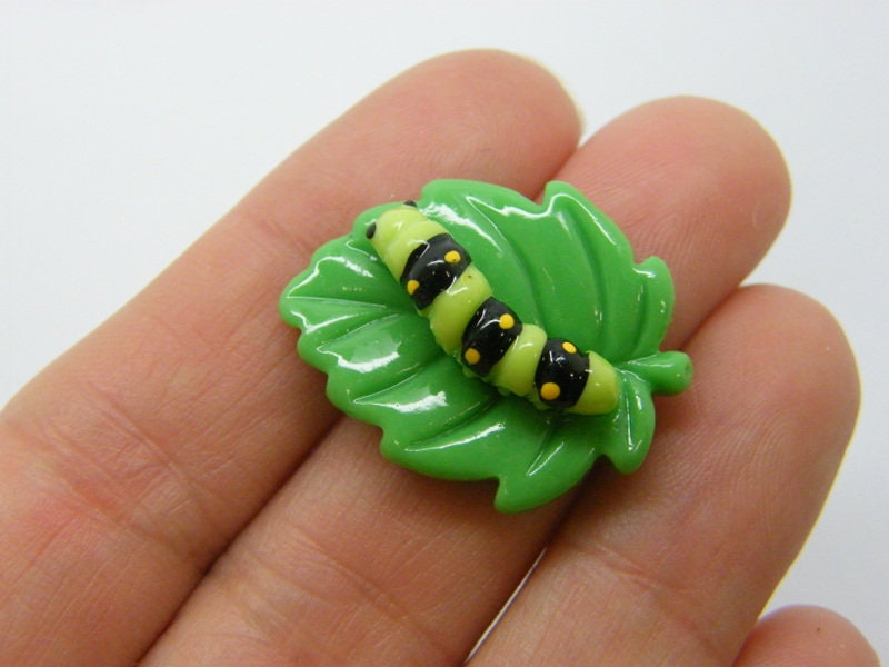 8 Caterpillar leaf embellishment cabochons green resin A552