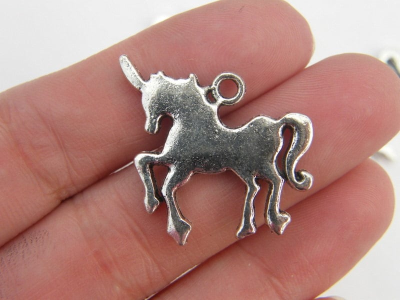 12 Unicorn pendants antique silver tone A401
