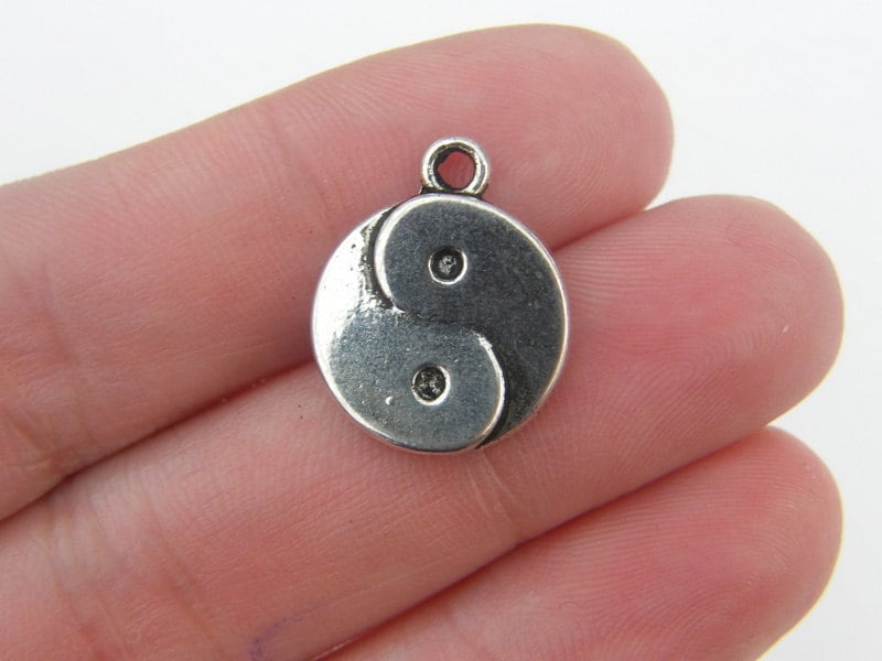 6 Yin and yang charms antique silver tone I22