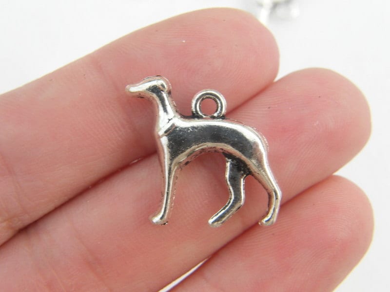 6 Dog charms antique silver tone A884