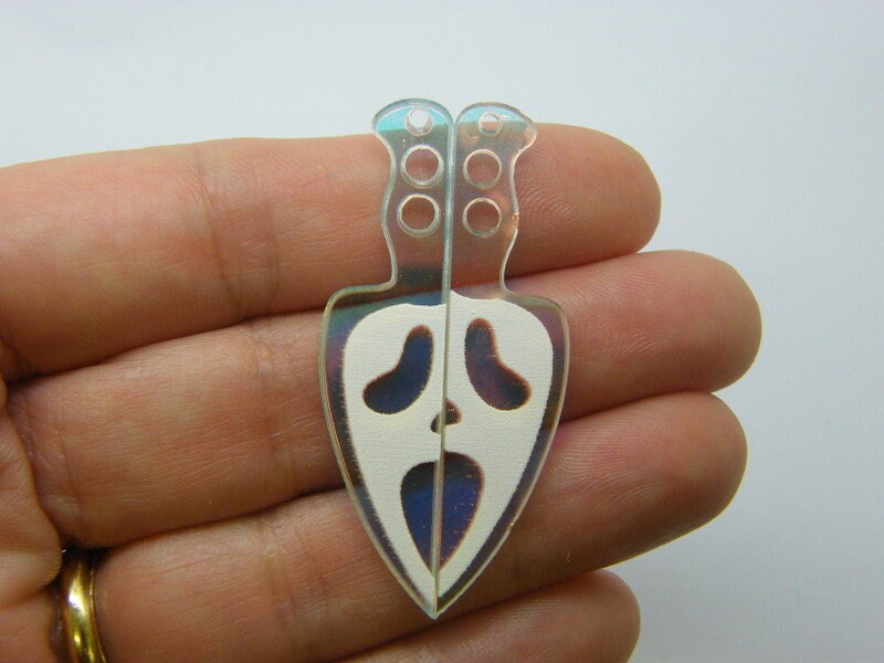 2 Knife face pendants acrylic HC589