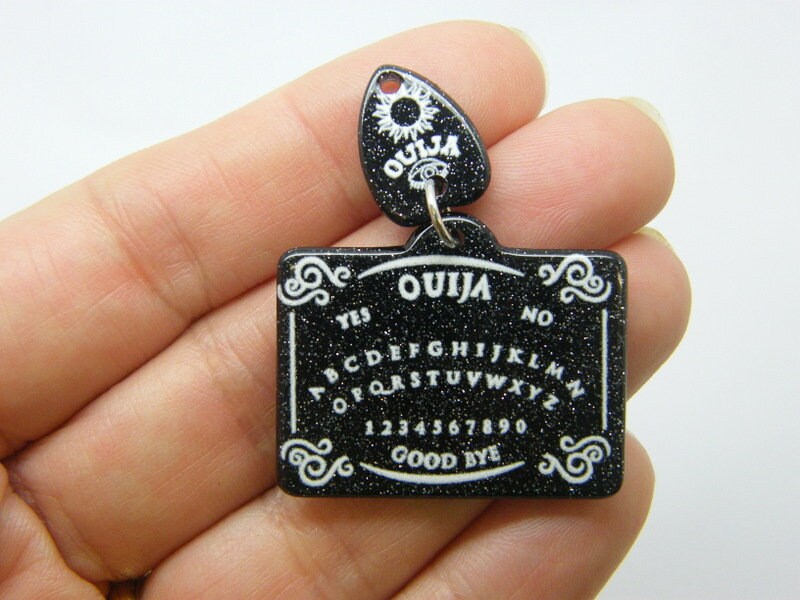 2 Ouija board and planchette pendants white black resin HC828
