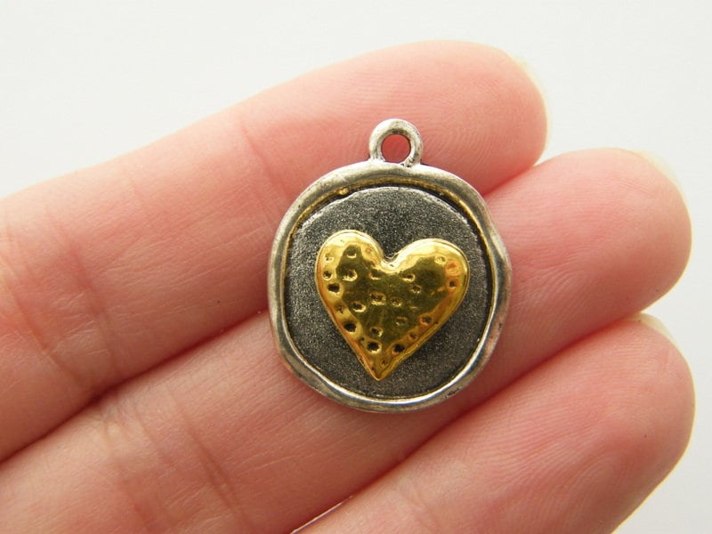 4 Heart charms silver and gold tone H7