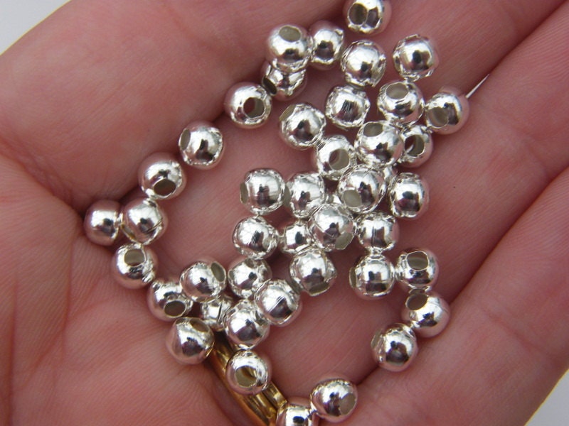 300 Spacer beads 5mm silver plated FS401