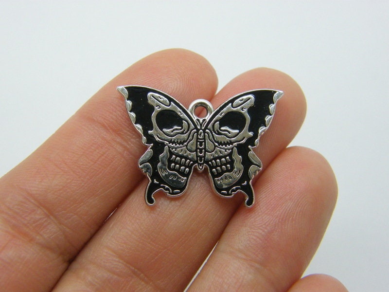 4 Moth butterfly skull charms black and silver tone HC165