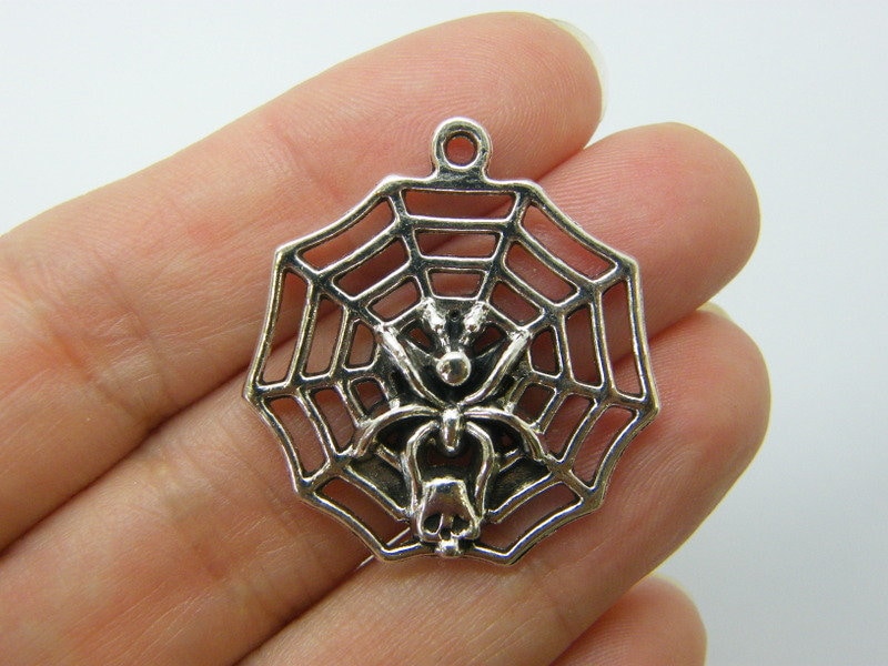 4 Spider in a spiderweb pendants charms antique silver tone HC1171