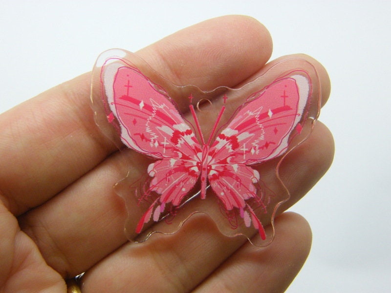 4 Butterfly pendants clear pink acrylic A58