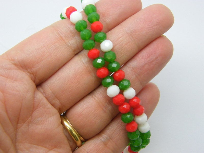 88 Christmas red green and white beads 6 x 5mm faceted glass B139