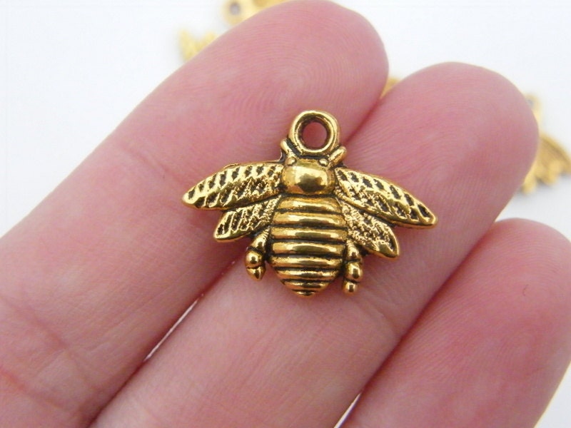 10 Bee charms antique gold tone A564