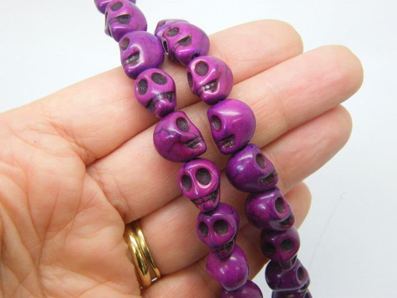 32 Skull beads magenta purple 12 x 10mm synthetic turquoise SK42