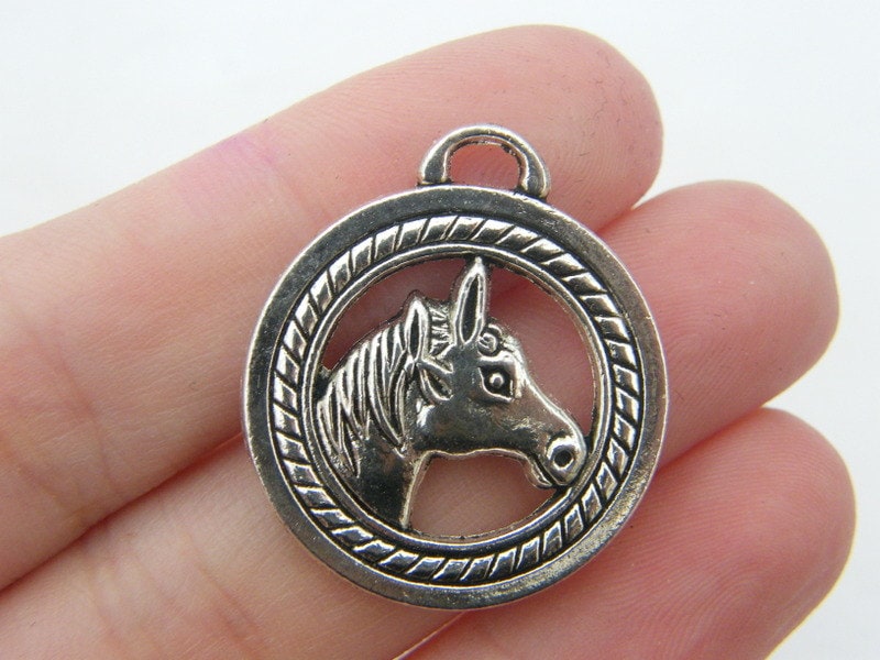 4 Horse pendants antique silver tone A596