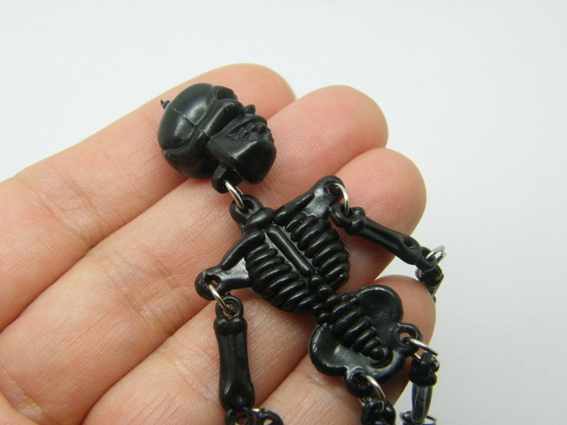 1 Skeleton pendant black glow in the dark PVC plastic HC1267