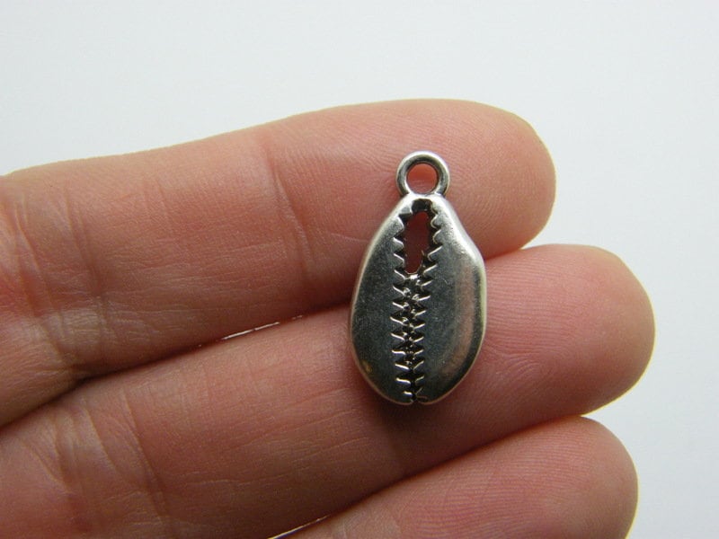 8 Shell cowrie charms antique silver tone FF364