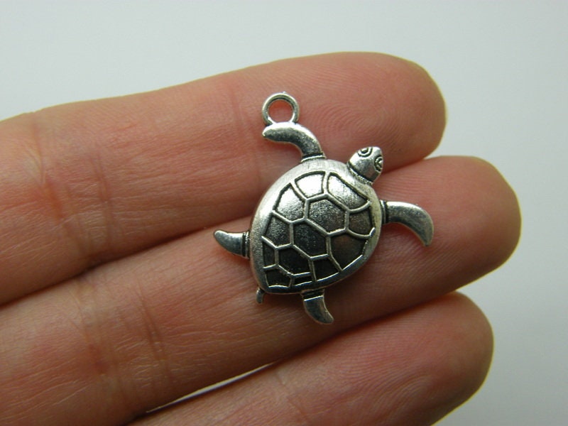 8 Turtle charms antique silver tone FF643