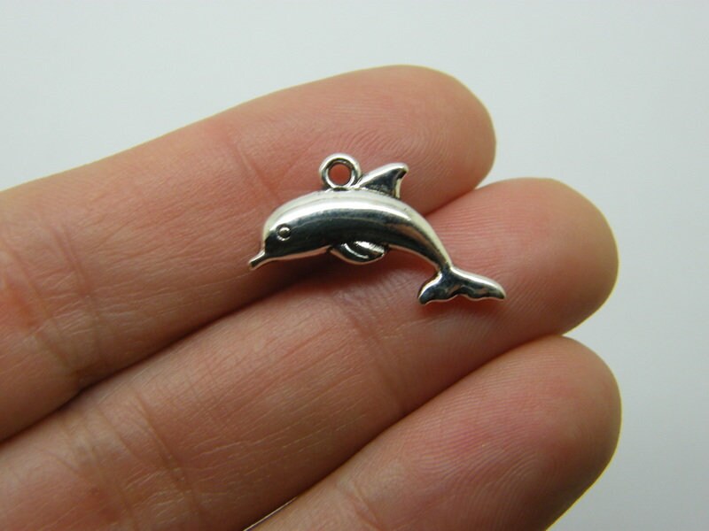 8 Dolphin charms antique silver tone FF129
