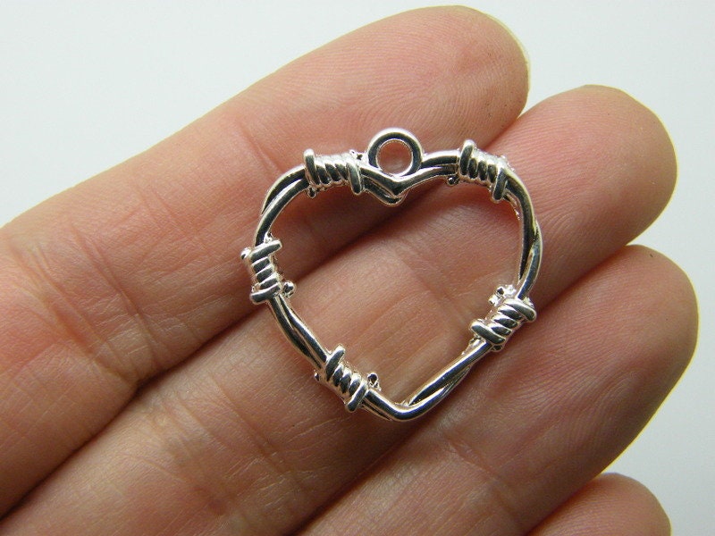 8 Heart barbed wire pendants silver plated tone H54