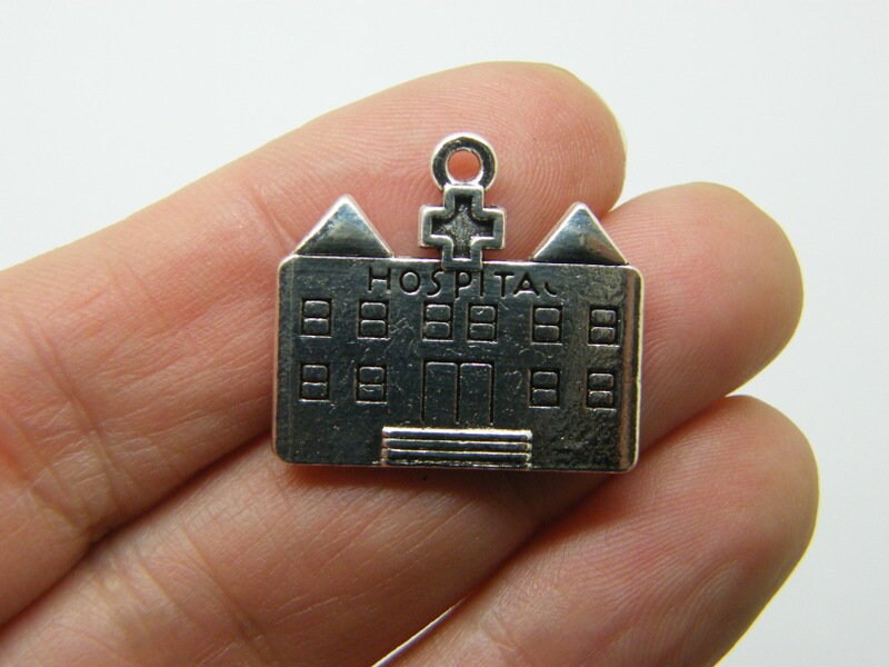 8 Hospital charms antique silver tone MD33