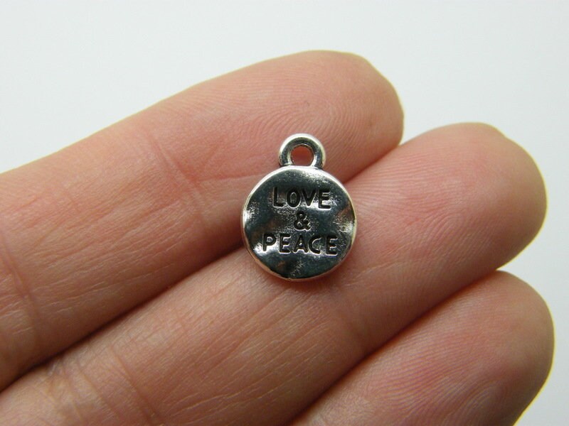12 Love and peace charms antique silver tone M12