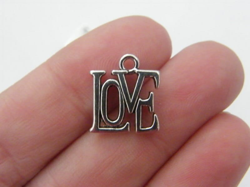 8 Love word charms antique silver tone M564