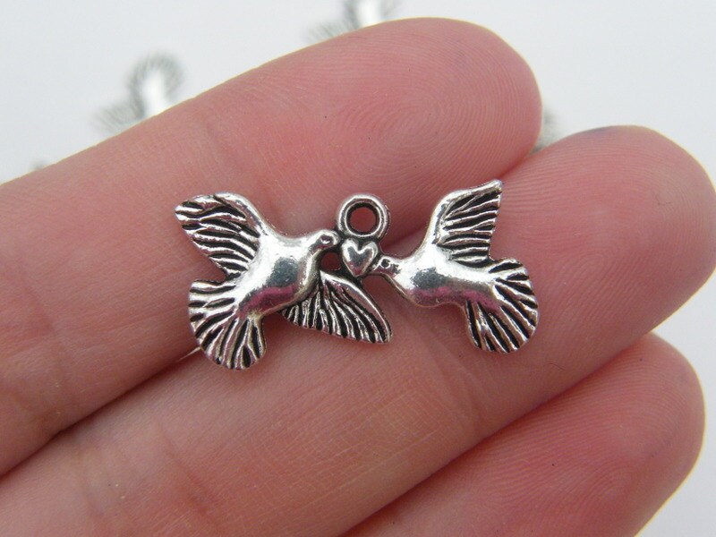 10 Doves and heart charms antique silver tone B93