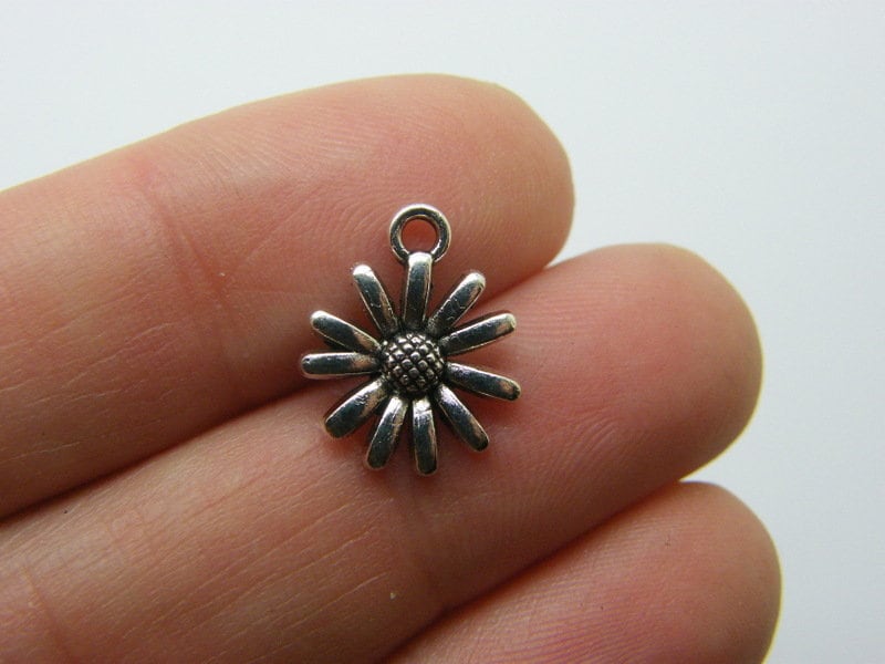 12 Flower daisy charms antique silver tone F306