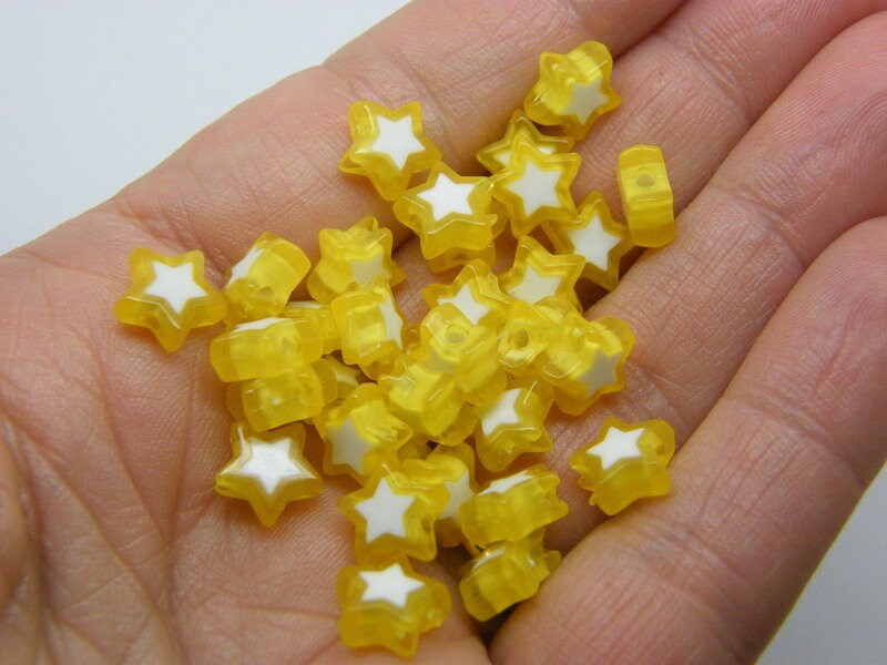 100 Star beads yellow white acrylic  AB619