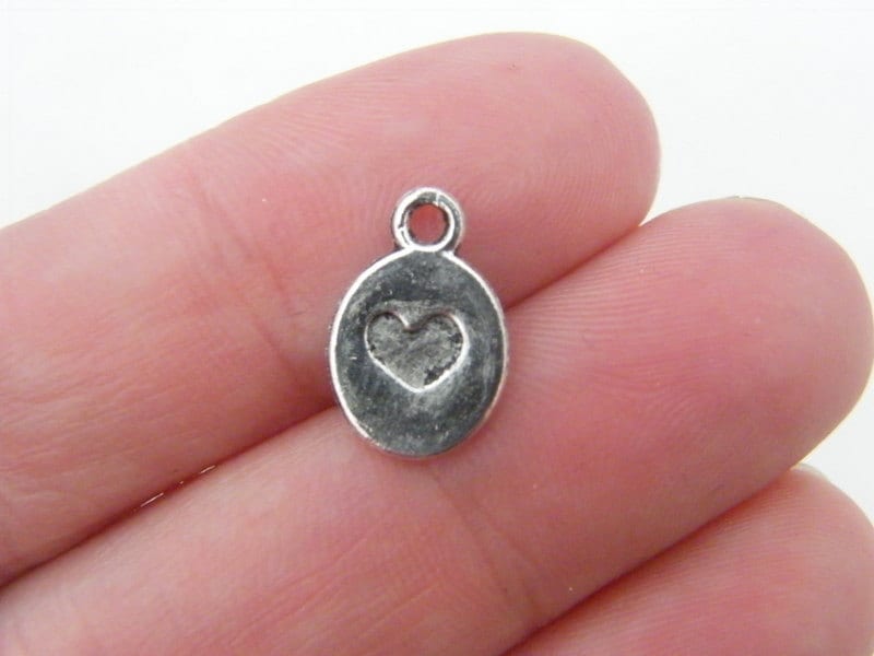 14 Heart charms antique silver tone H40