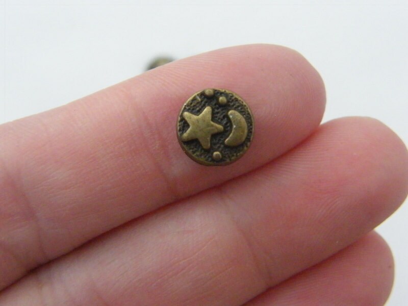 16 Star and moon spacer bead antique bronze tone S266