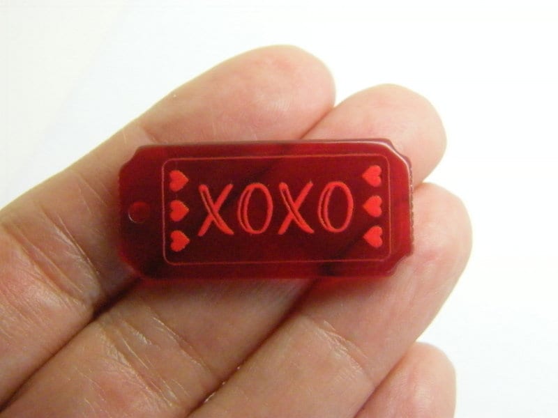 2 XOXO hearts ticket charms acrylic P