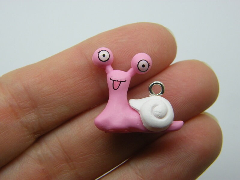 2 Snail pendants pink white resin A1189