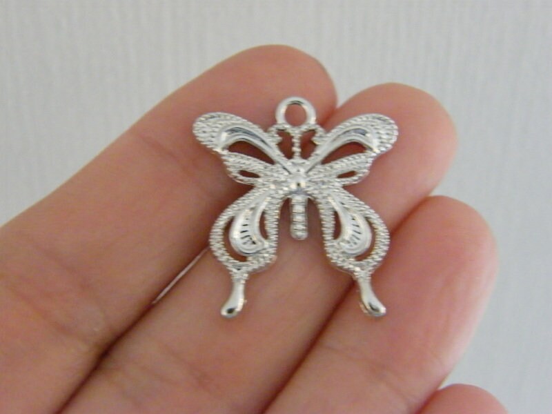 6 Butterfly pendant silver plated tone A885