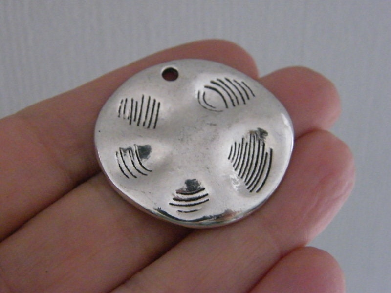 8 Paw print pendants antique silver tone A765