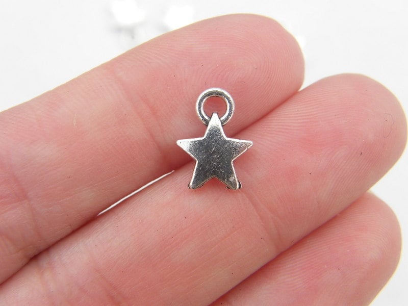 14 Star charms antique silver tone S5