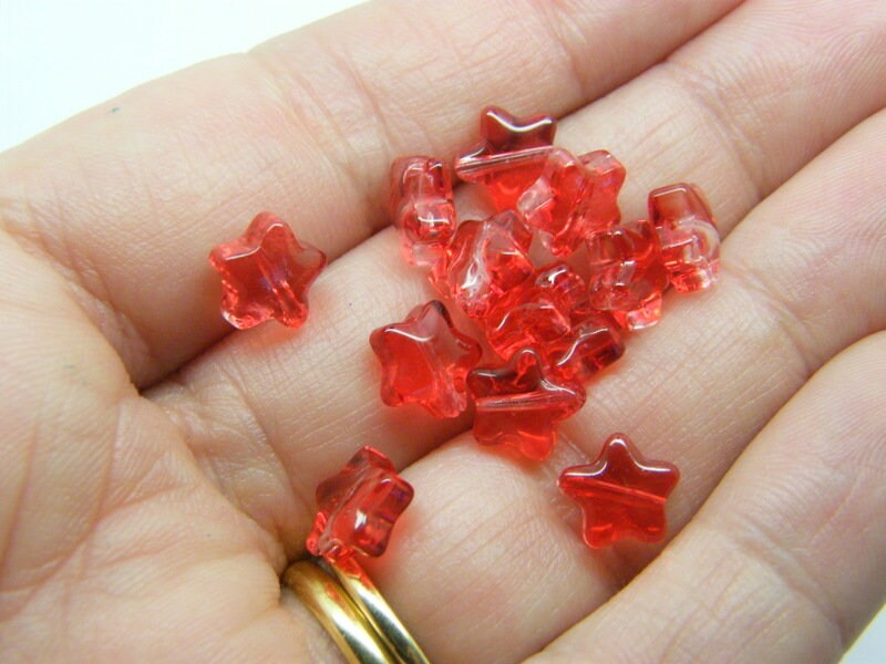 30 Star beads red  glass AB287