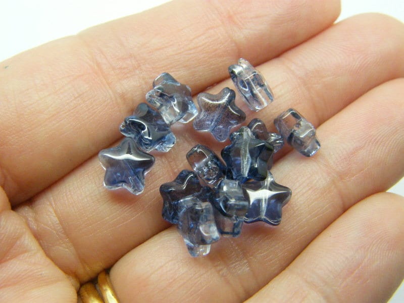 30 Star beads prussian blue glass AB
