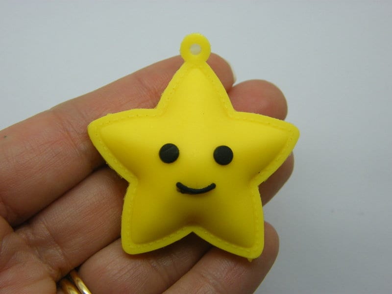 4 Star pendants yellow PVC plastic S