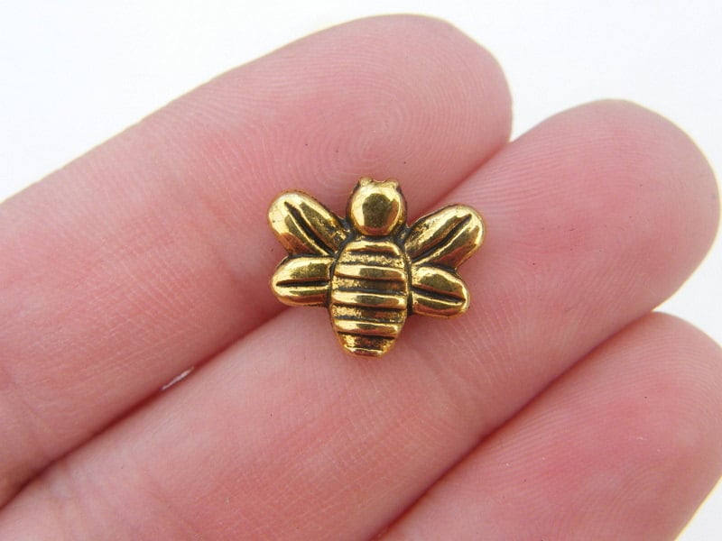 BULK 50 Bee spacer beads antique gold tone A565
