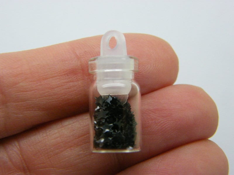 10 Mini glass bottles with plastic lid pendants black star sequins M