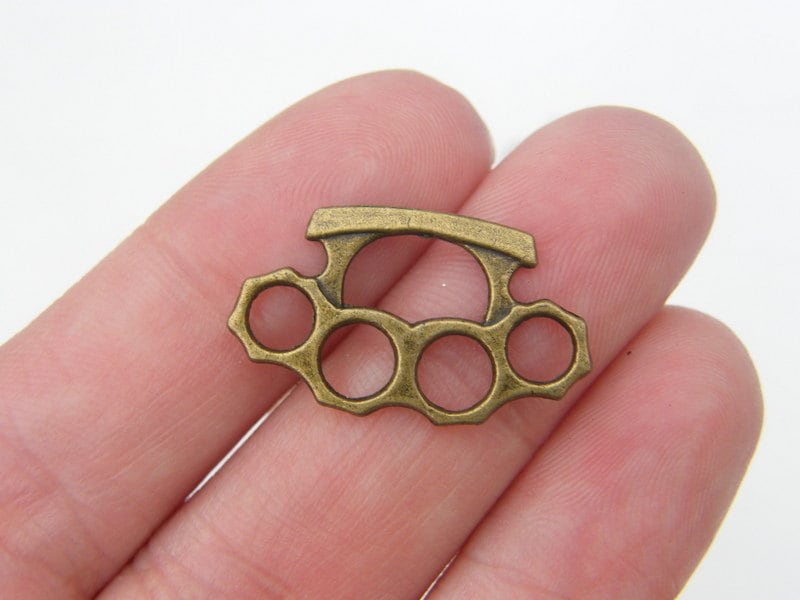 8 Brass knuckles antique bronze tone G36