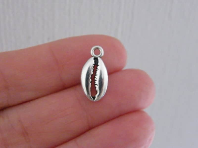 10 Shell cowrie charms antique silver tone FF450