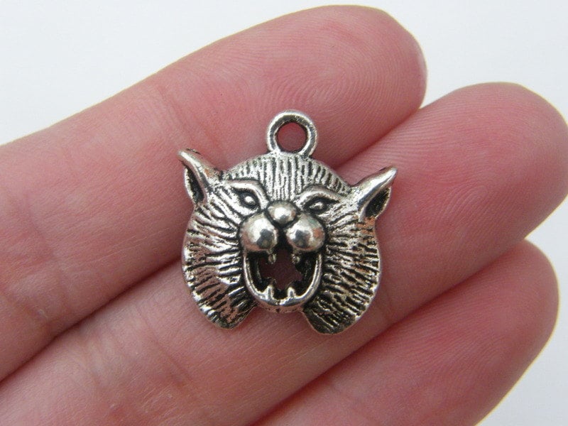 6 Wildcat charms antique silver tone A153