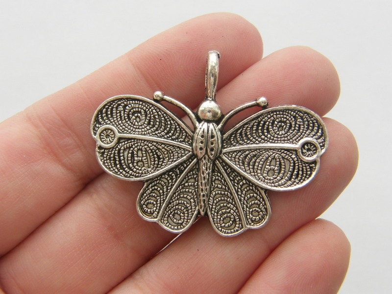 2 Butterfly pendants antique silver tone A360