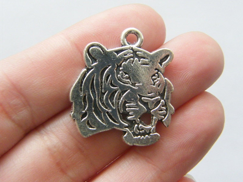 4 Tiger charms antique silver tone A150