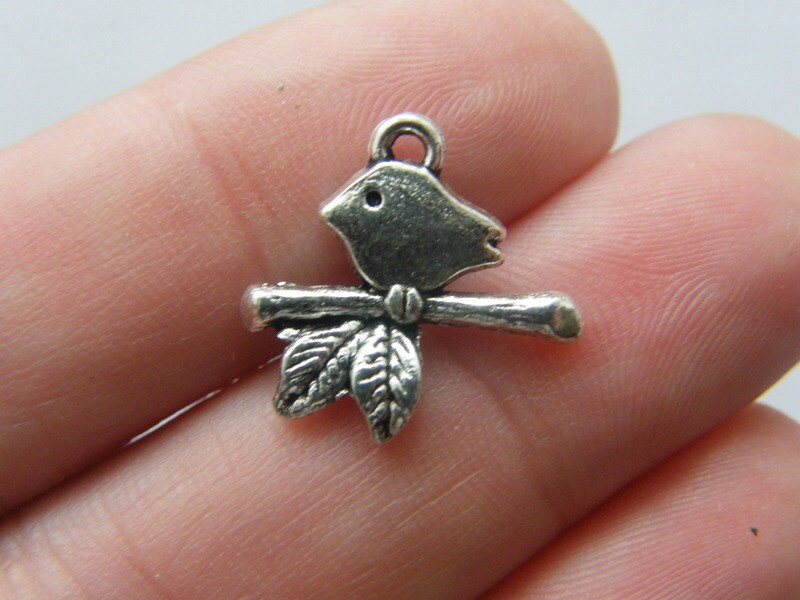 10 Bird on a branch charms antique silver tone B66